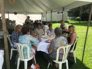 Event Guests Sitting Down for Sweet Bites