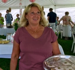 Volunteer Serving Sweet Bites to Event Guests