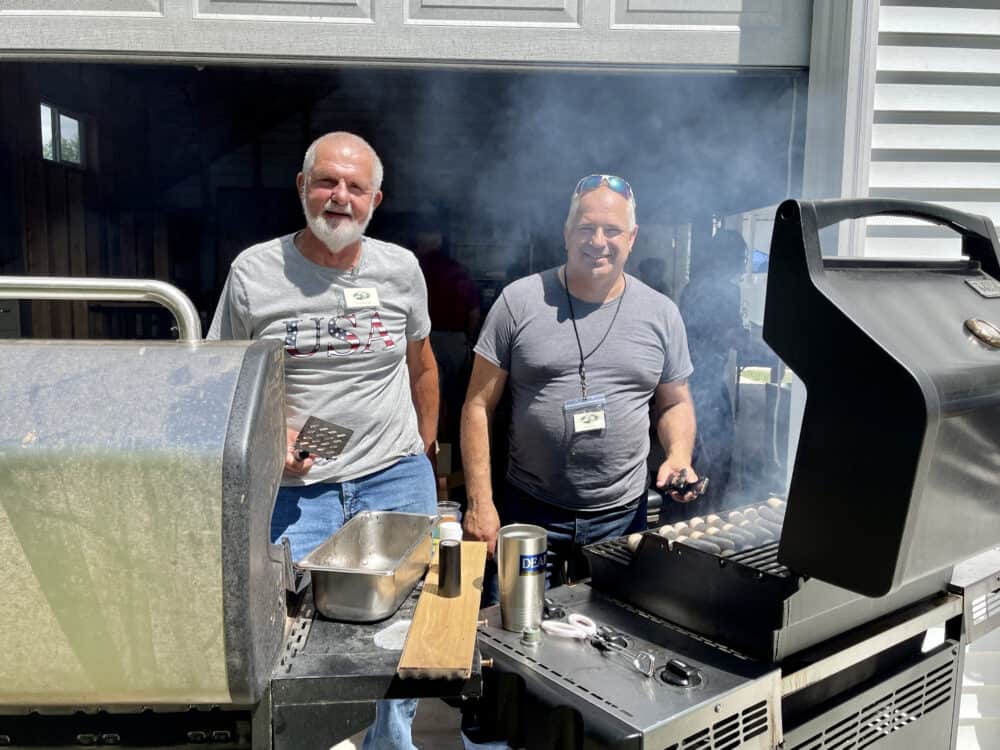 Volunteers making brats